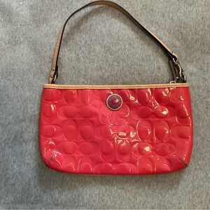 Coach pink patent leather clutch